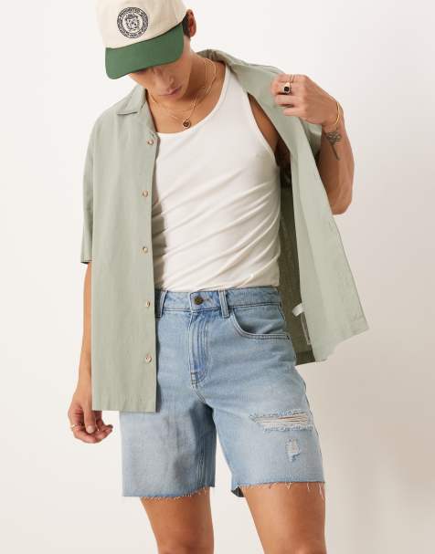 ASOS DESIGN mid length slim denim shorts with rips in light wash blue - view 1