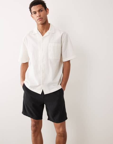 ASOS DESIGN mid length slim linen blend shorts in black - view 1