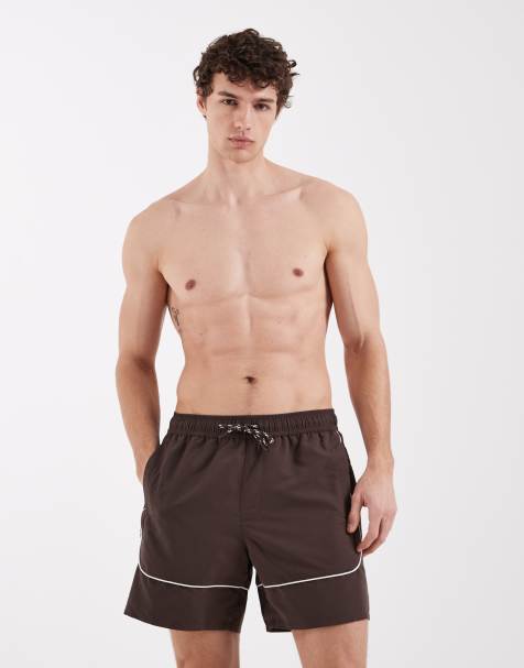 ASOS DESIGN mid length swim shorts in brown with contrast white binding - view 1
