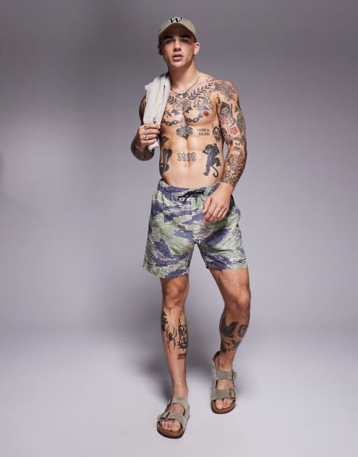 ASOS DESIGN mid length swim shorts in green camouflage print, 2 of 4