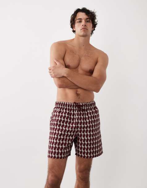 ASOS DESIGN mid length swim shorts in wavey burgundy print - view 1