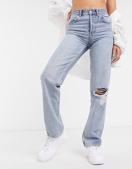 ASOS DESIGN organic cotton blend mid rise '90's' straight leg jeans in midwash with rips