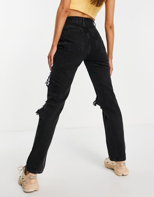 ASOS DESIGN mid rise 90s straight leg jeans in washed black with extreme rips BLACK