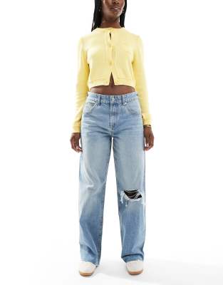 mid rise baggy boyfriend jeans with rips in mid blue