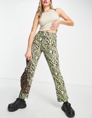 ASOS DESIGN mid rise exaggerated flare jean in lime and chocolate zebra print