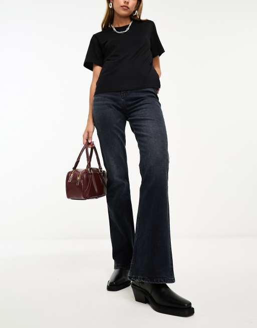 ASOS DESIGN mid rise flare jeans in blue black