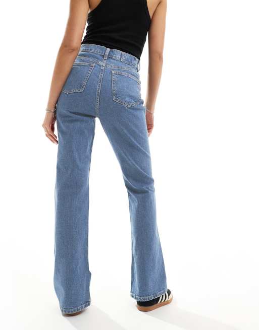 ASOS DESIGN flared jeans in mid blue