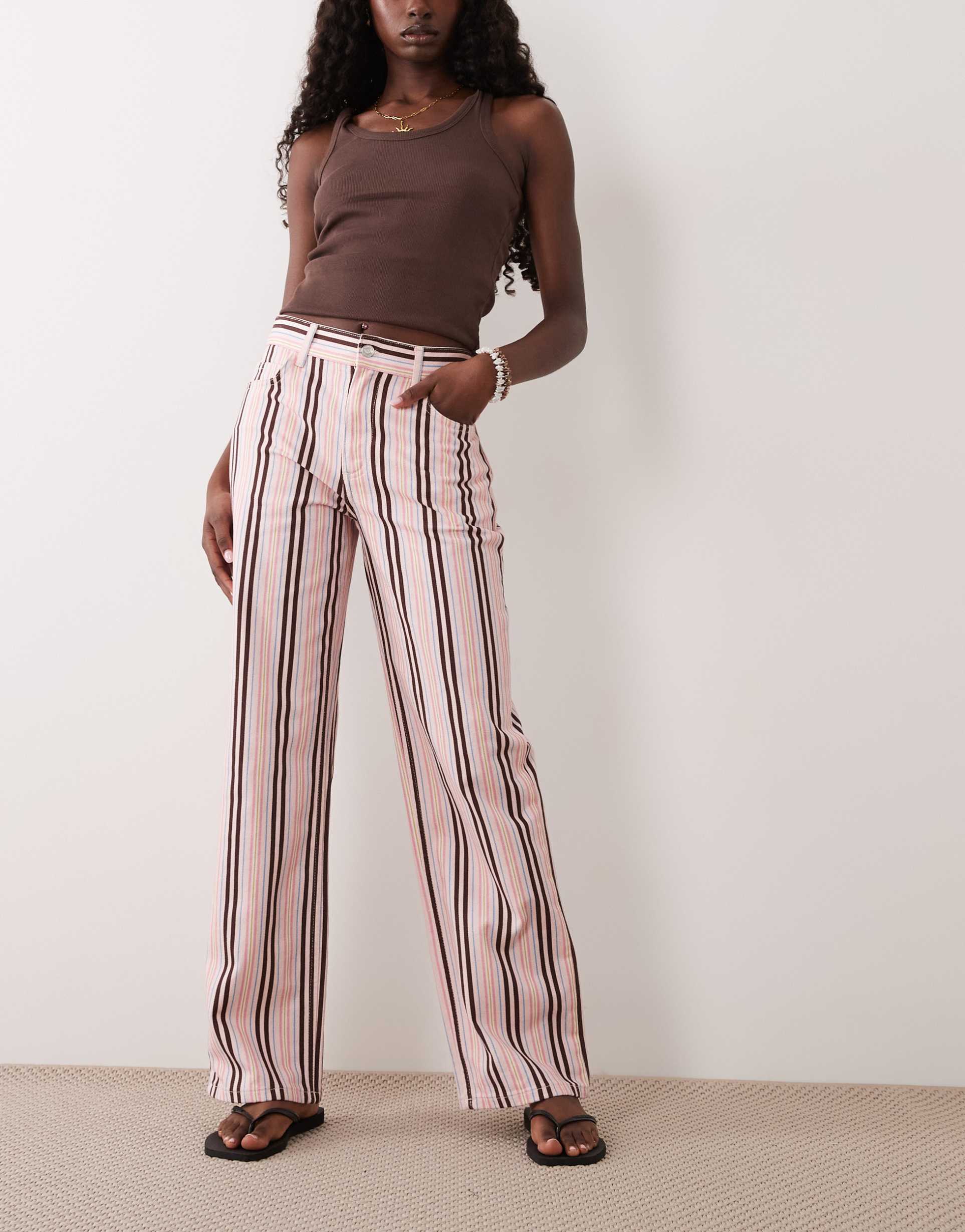 asos design mid rise slim leg jean in pink stripe