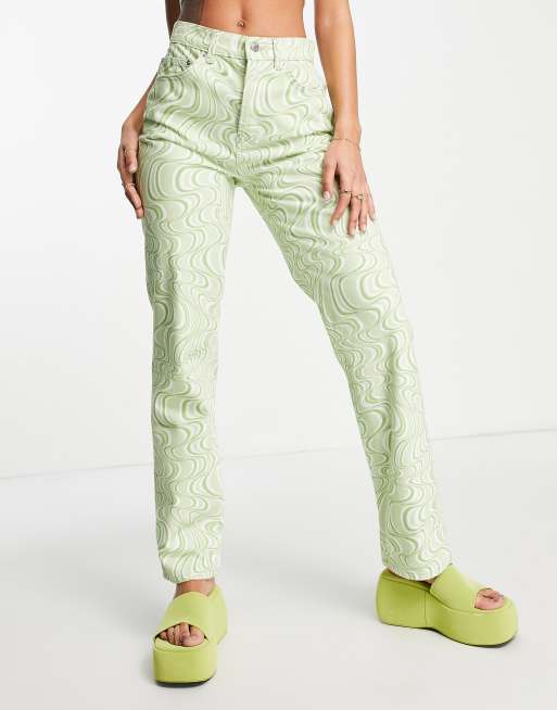 ASOS DESIGN mid rise straight jeans in green swirl print