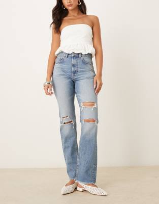 ASOS DESIGN mid rise straight jeans in lightwash with rips