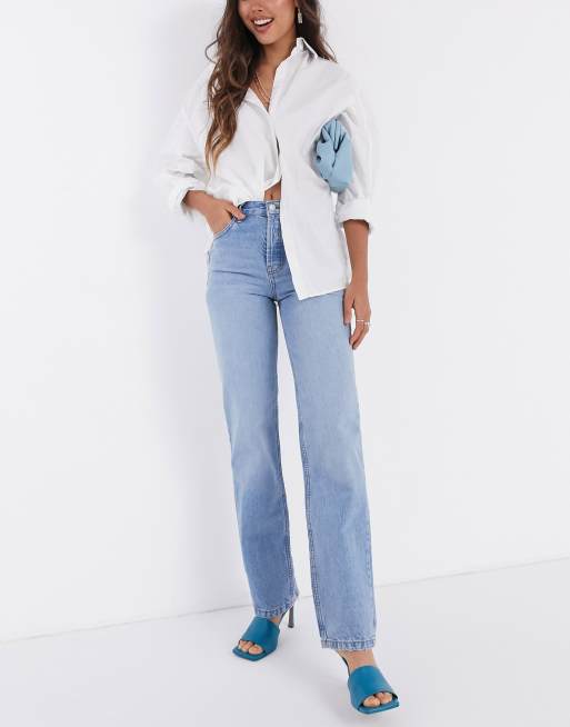 ASOS DESIGN mid rise straight jeans in midwash