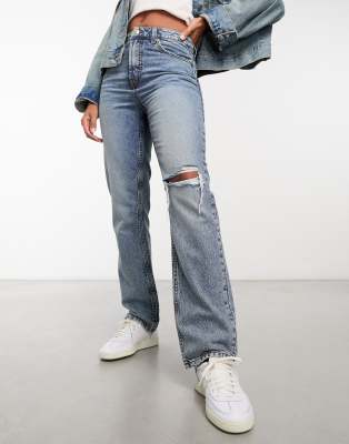 mid rise straight jeans with knee rip in blue