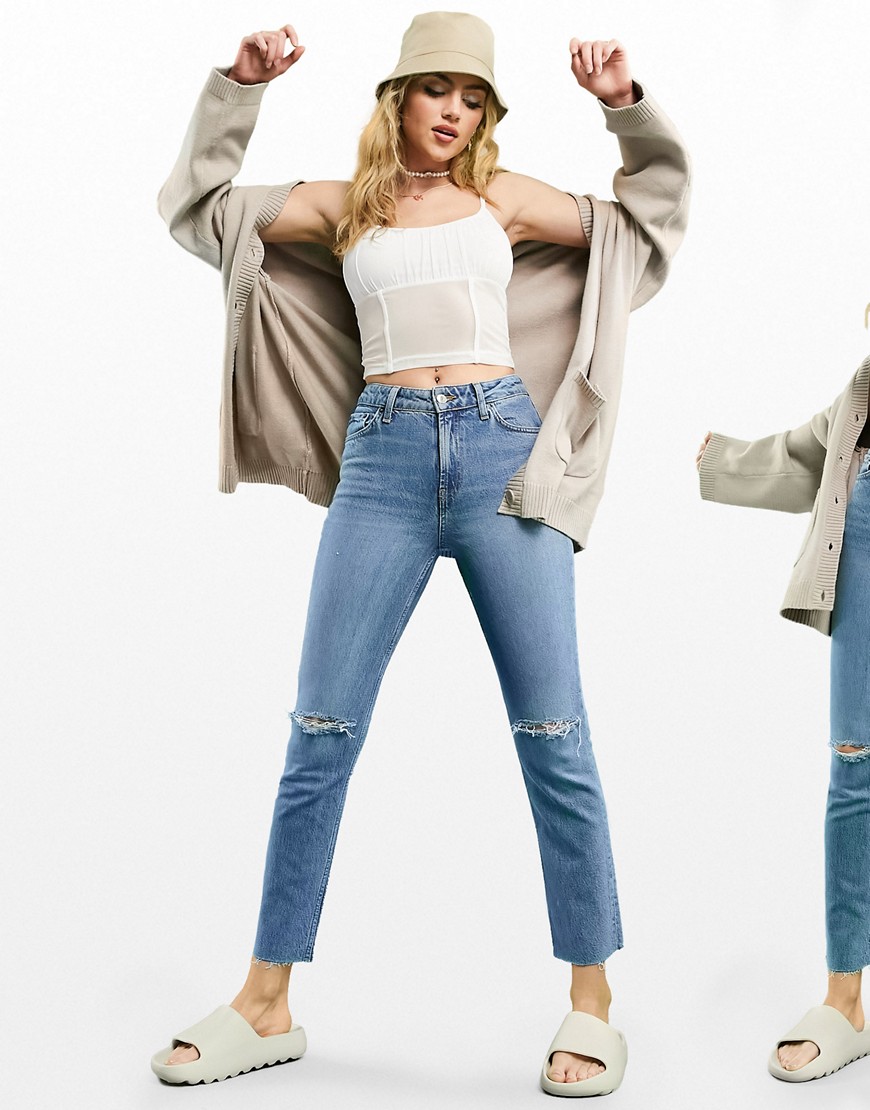 ASOS DESIGN mid rise vintage 'skinny' jeans in midwash with rips-Blues