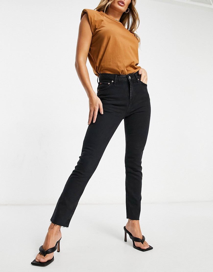ASOS DESIGN mid rise vintage 'skinny' jeans in washed black-Blues