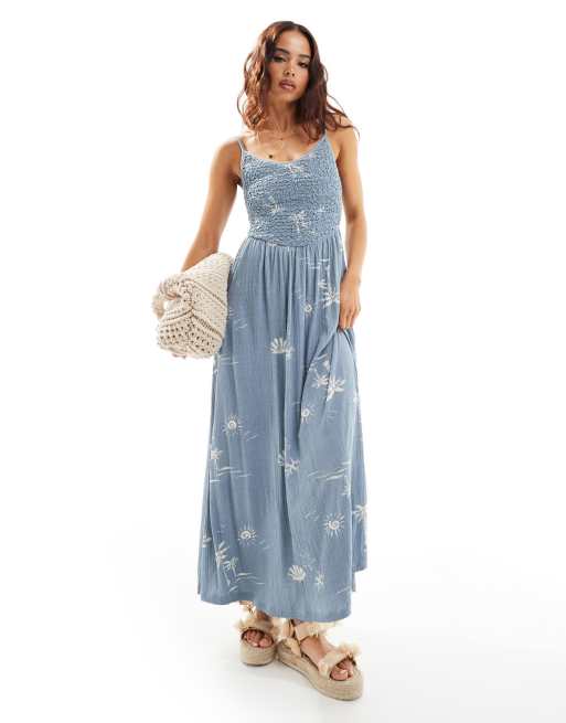 ASOS DESIGN - Midi cami jurk van kreukelstof met gesmokt lijfje en volle rok in tropische print