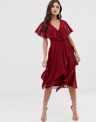 asos design midi dress with cape back and dipped hem in embellishment