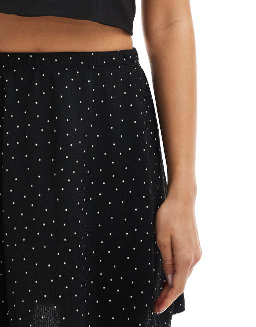 ASOS DESIGN Midi rok in zwart met stippen ASOS