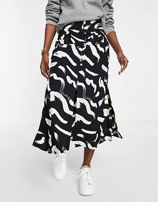 Glad geschenk Uitgang ASOS DESIGN - Midi-rok met knopen en zwart-witte vlekkenprint | ASOS