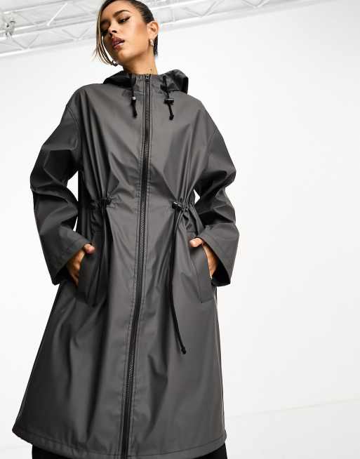 ASOS DESIGN midi rubberised rain coat with dipped hem in charcoal