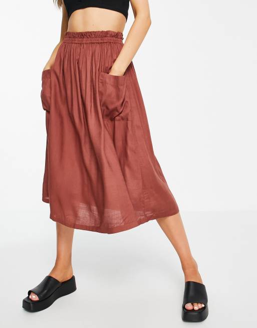 ASOS DESIGN midi skirt with pocket detail in chocolate