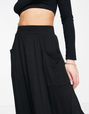 ASOS DESIGN midi skirt with pockets in black