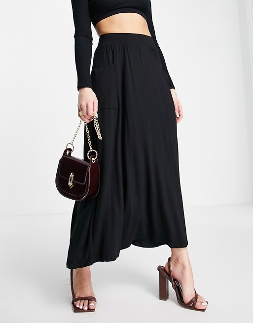 ASOS DESIGN midi skirt with pockets in black