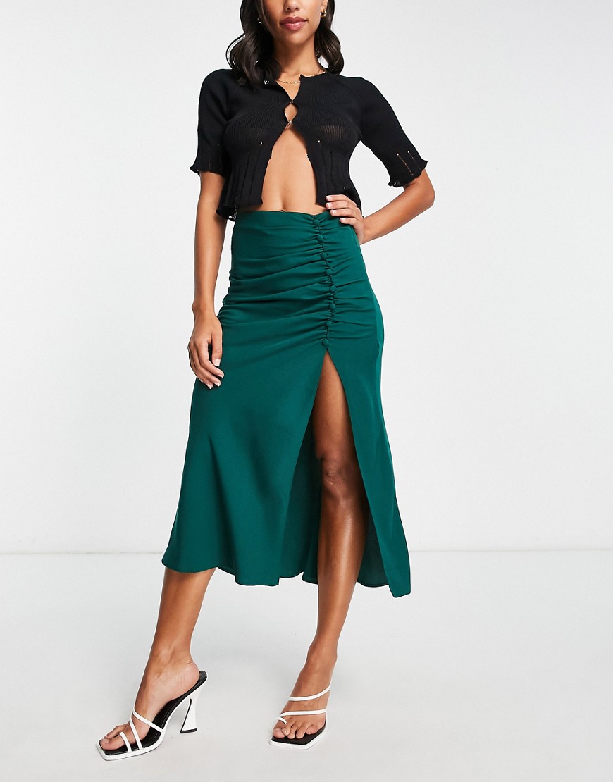 ASOS DESIGN midi skirt with ruched side and button detail in dark green
