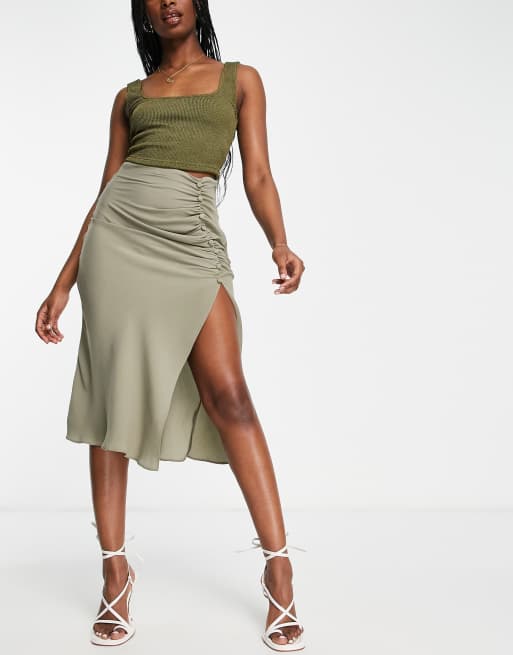 ASOS DESIGN midi skirt with ruched side and button detail in light khaki