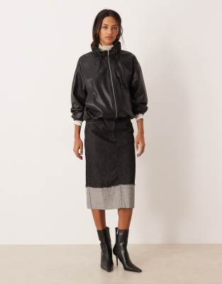 ASOS DESIGN midi skirt with turn back distressed hem in black
