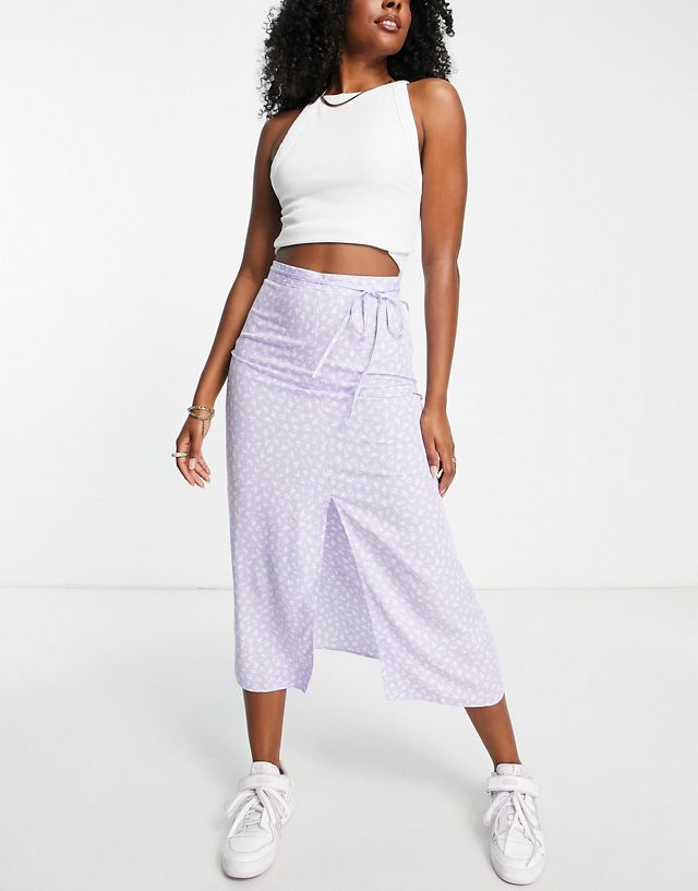 ASOS DESIGN midi slip skirt with front slit in lilac floral print