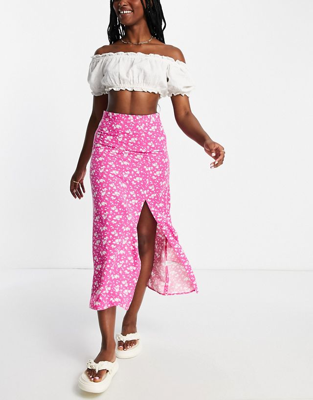 ASOS DESIGN midi slip skirt with thigh slit in pink ditsy print TB9704