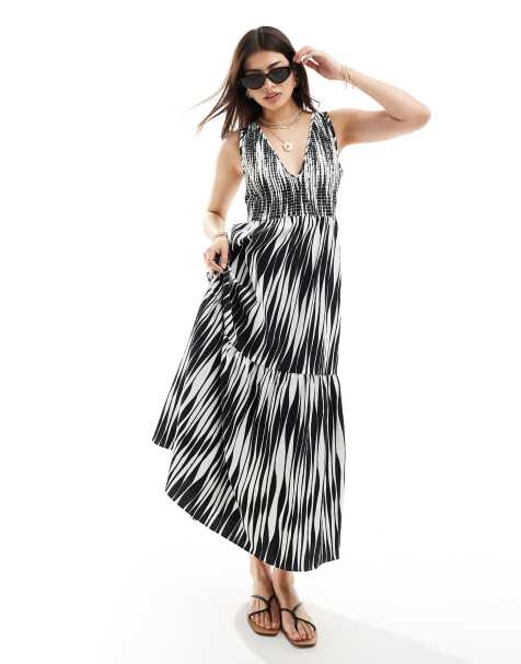 ASOS DESIGN - Midi zonnejurk van kreukelstof met V-hals, rok met stroken en abstracte print - view 1