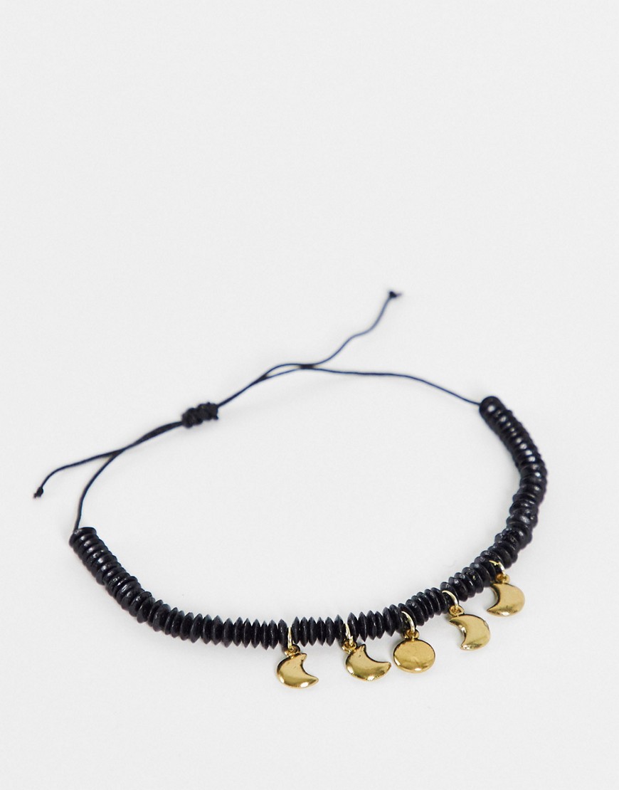 ASOS DESIGN midweight 6mm beaded anklet with sun and moon pendants in black