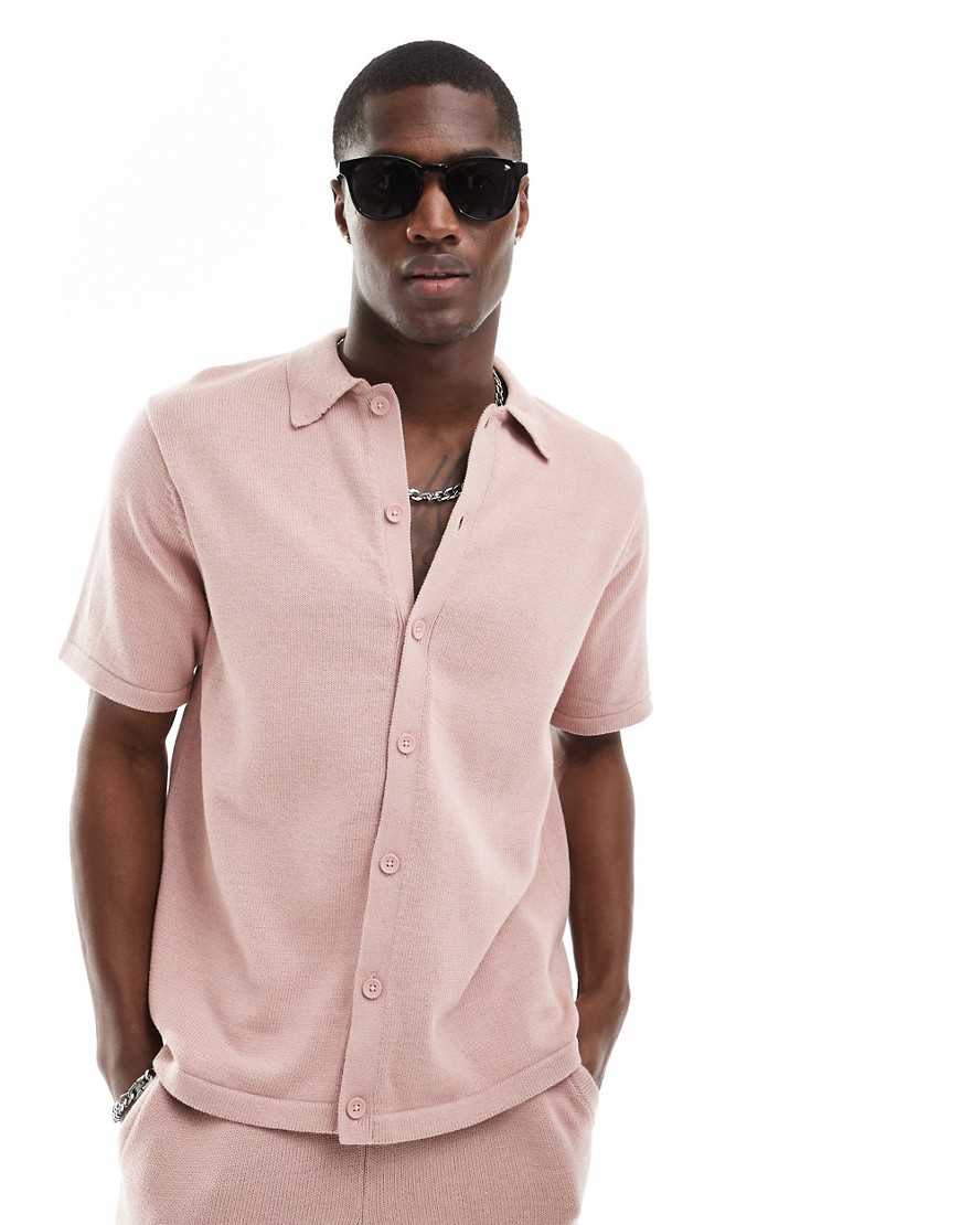 ASOS DESIGN midweight knitted cotton button through polo in pink