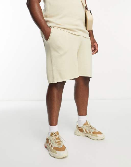 ASOS DESIGN midweight knitted cotton shorts in stone part of a set