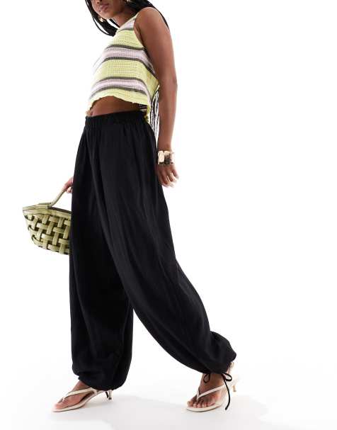 ASOS DESIGN soft textured oversized billow trousers with tie hem in black