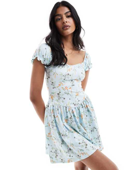 ASOS DESIGN milkmaid puff sleeve mini dress with drop waist in blue ditsy  print | ASOS