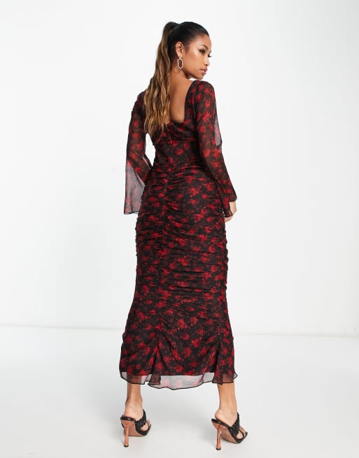 Black dress with red flower clearance print