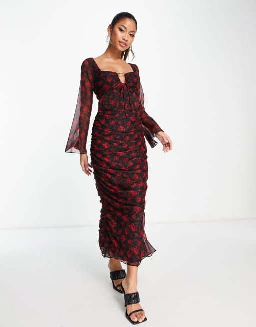 Black dress with red floral 2025 print