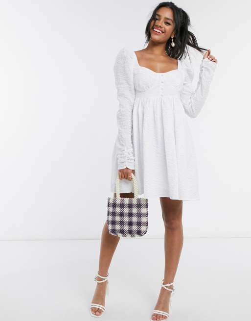 ASOS DESIGN mini babydoll dress in texture in white