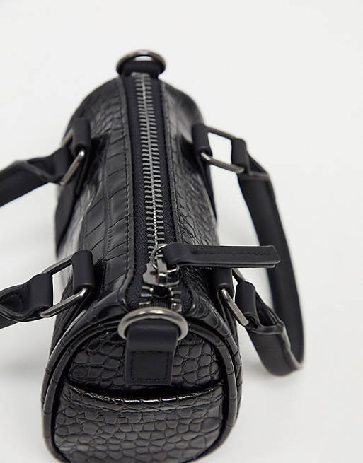 ASOS DESIGN mini barrel bag with cross body strap in black faux leather