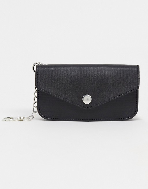 ASOS DESIGN mini belt bag in black faux leather with clip