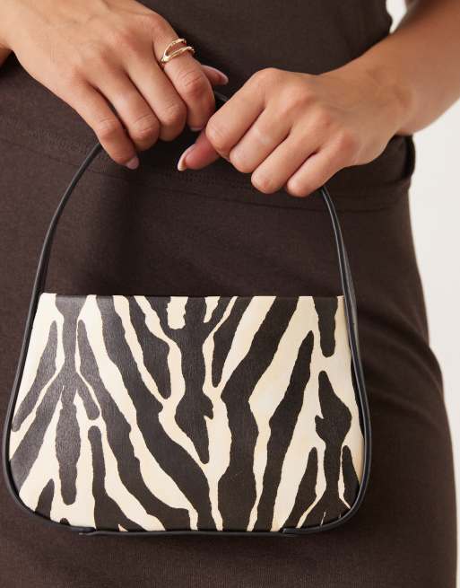 ASOS DESIGN mini clutch bag in zebra print