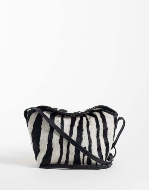 ASOS DESIGN mini crossbodytas van leer met haarstructuur en klep in zebra print - view 1
