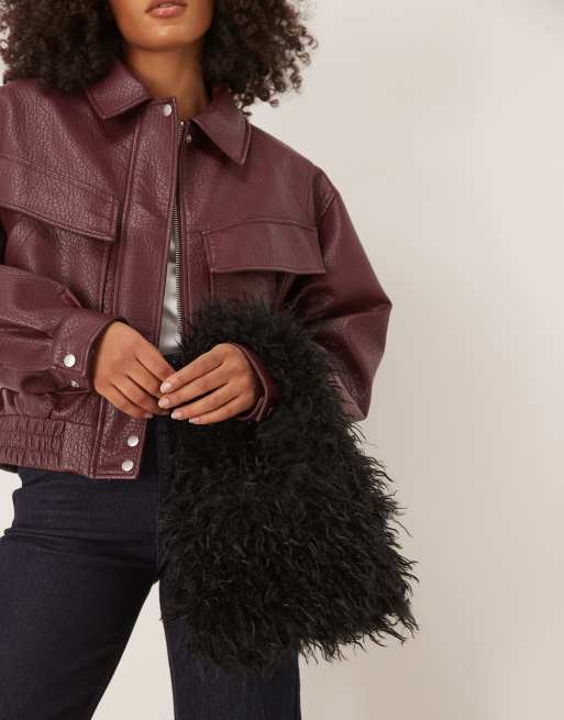 ASOS DESIGN mini curly faux fur tote bag in black