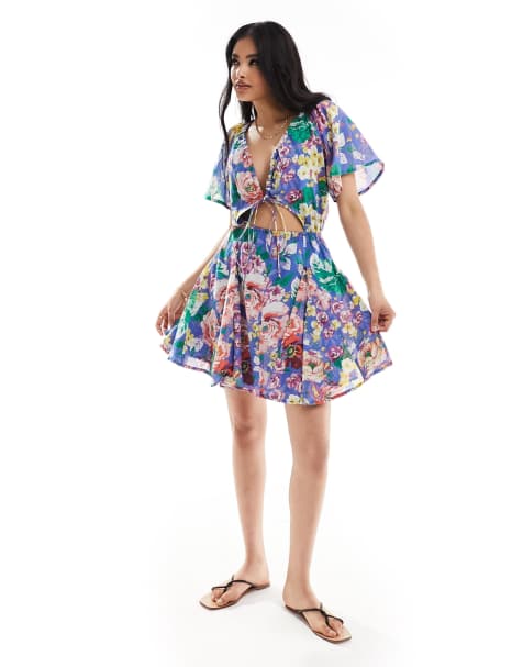ASOS DESIGN mini cut out dress with godet skirt in blue floral print - view 1