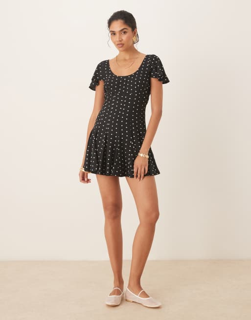 ASOS DESIGN mini day dress with godet hem in polka dots
