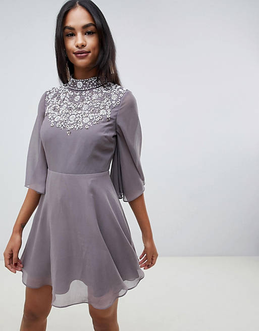 ASOS DESIGN mini dress with flutter cape and pretty pearl embellishment