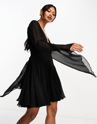 ASOS DESIGN mini dress with godet and asymmetric sleeve detail in black - ASOS Price Checker
