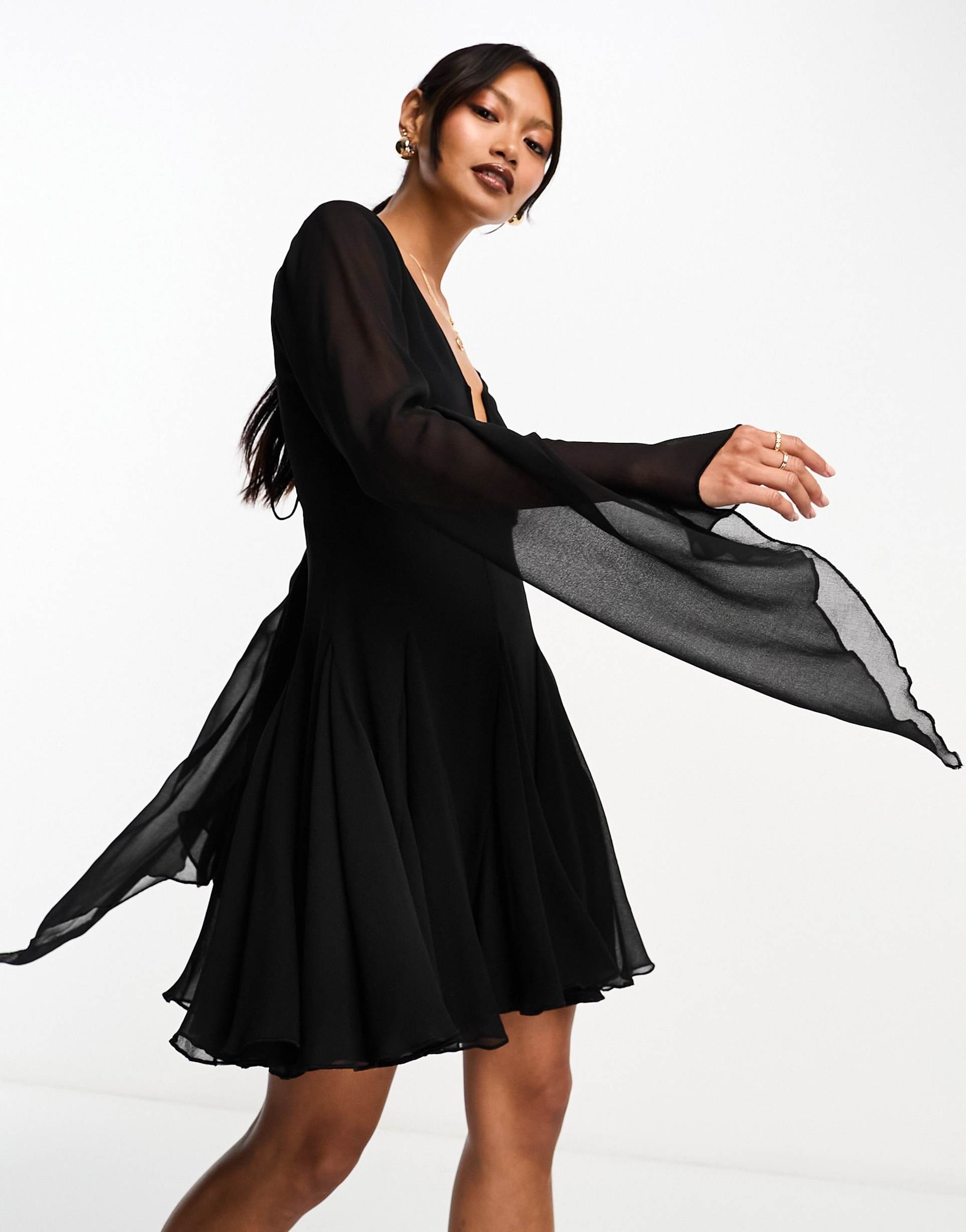 asos design mini dress with godet and asymmetric sleeve detail in black